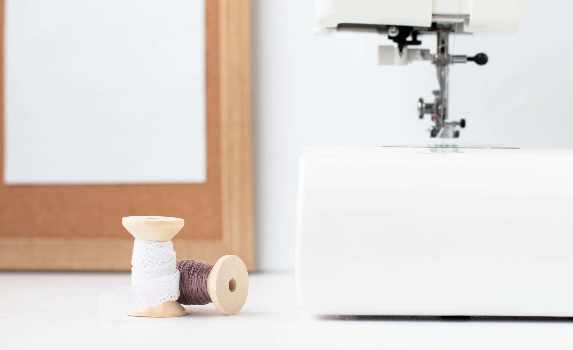 Workshop interior with sewing machine and threads